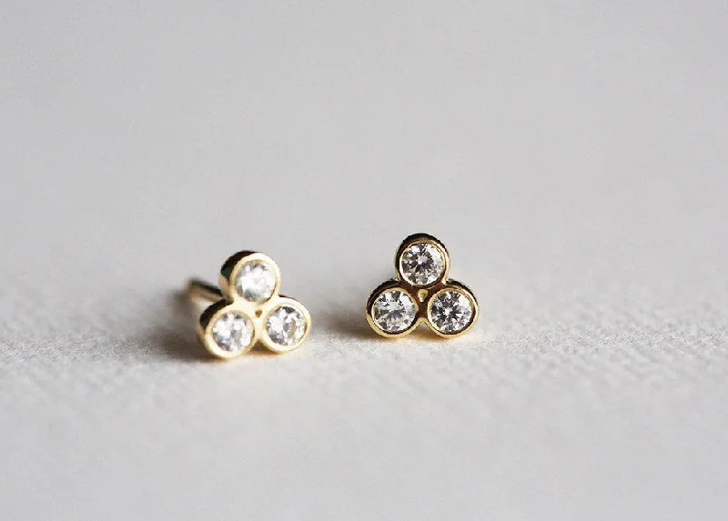 Gold Stud Earrings With 3 Small Round Cut Diamonds Apiece